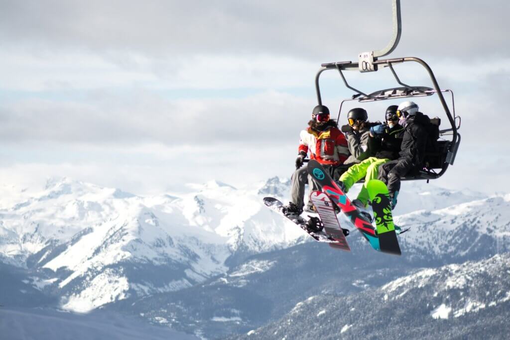 Skiers on a chairlift