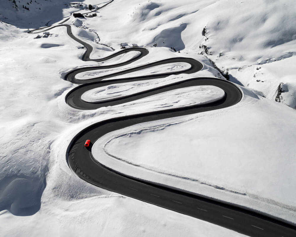 Snowy road in Swiss Alps