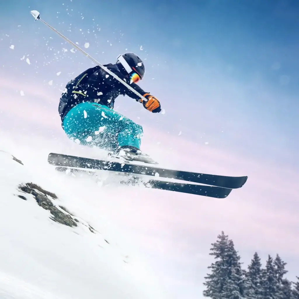A skier jumping down a slope
